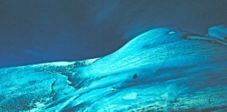 Why some icebergs are green