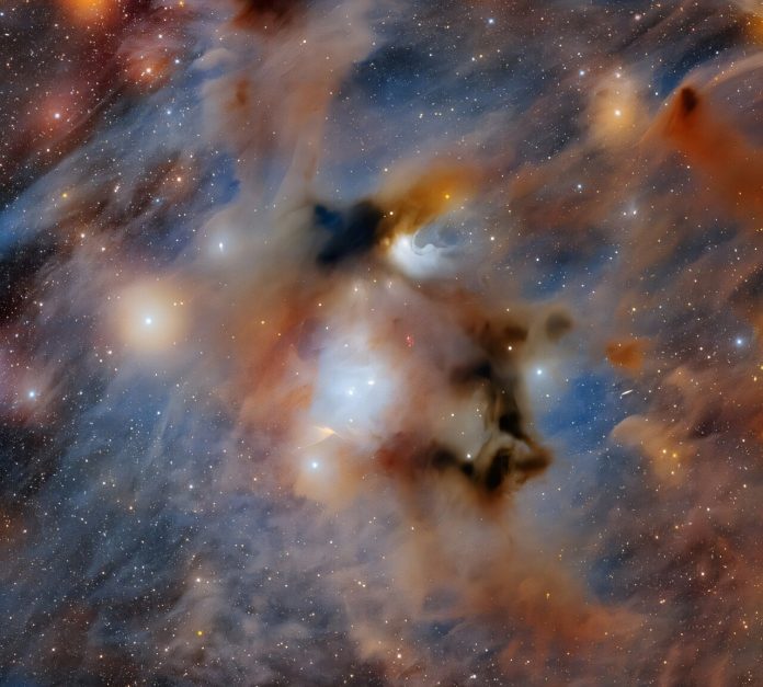 A star is born Stunning new image reveals baby stars in a nearby cosmic cloud