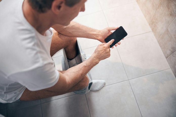 Seven health conditions that show why using your phone on the toilet is a bad idea
